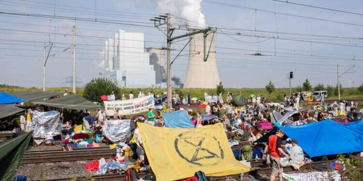 מחאה נגד תעשיית החשמל הפחמי בגרמניה. צילום: AFP צילום: AFP