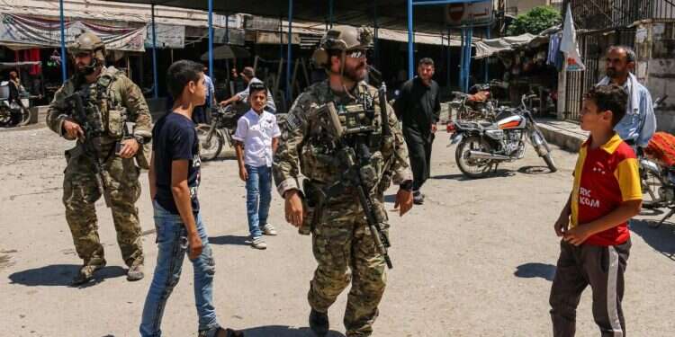 הנסיגה תזרז את הזרמת התחמושת מאיראן. חיילים אמריקנים בסוריה. צילום: AFP צילום: AFP