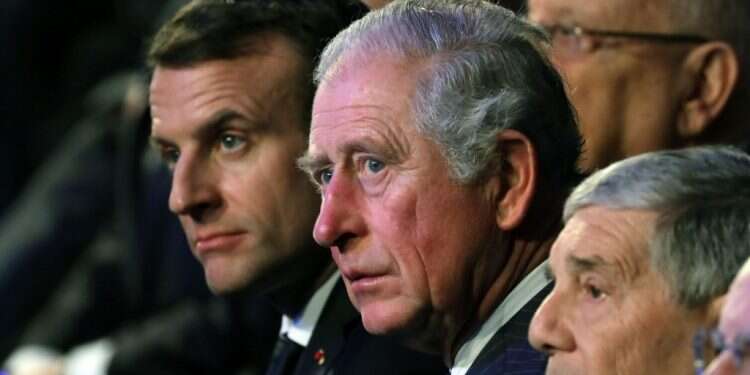 הנסיך צ'ארלס ונשיא צרפת עמנואל מקרון בטקס ביד ושם. צילום: AFP 75 שנה לשחרור אושוויץ: מנהיגי העולם הגיעו לישראל