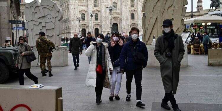 מילאנו, שבוע שעבר. צילום: AFP מלונות ואצטדיונים ריקים: הקורונה מכה קשות בכלכלת איטליה