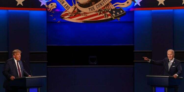 טראמפ וביידן בעימות. צילום: איי.אף.פי תיקו אפס: העימות הנשיאותי הנמוך בהיסטוריה