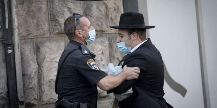 כיצד בחברה האמונה על  הנחיות הקורונה נתפסות כאיום קיומי בקהילה החרדית