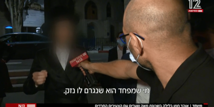 אוהד חמו בכתבה בחדשות 12, אמש. צילום מסך מתוך N12 בלי טעם, עם ריח רע: הגישה החרדית איבדה כיוון