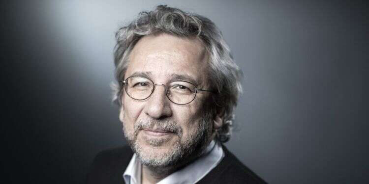 קאן דונדר. איי.אף.פי עיתונאי טורקי נידון בהיעדרו ל־27 שנות מאסר בעוון "ריגול"