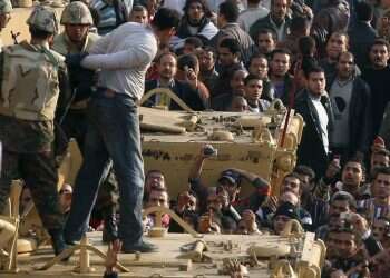 הפגנות האביב הערבי בכיכר תחריר, 2011. צילום: AFP סיפור של דת ושלטון: סעודיה נגד "האחים המוסלמים"