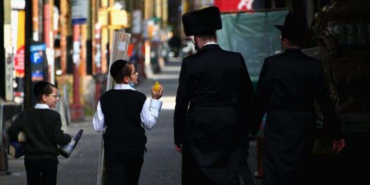 גברים חרדים. אילוסטרציה. צילום: AFP הקורונה הוכיחה: החוסן התעסוקתי של גברים חרדים נמוך