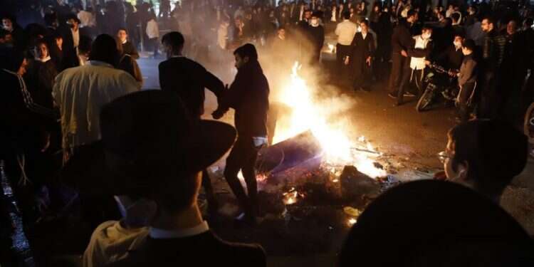 הנשירה בחינוך החרדי גבוהה פי שלוש מבחינוך הממלכתי. בני-ברק. למצולמים אין קשר לתוכן המאמר. צילום: איתן אלחרז, TPS "אני אומרת לילדים שלי: אתם רואים שוטר? תברחו"