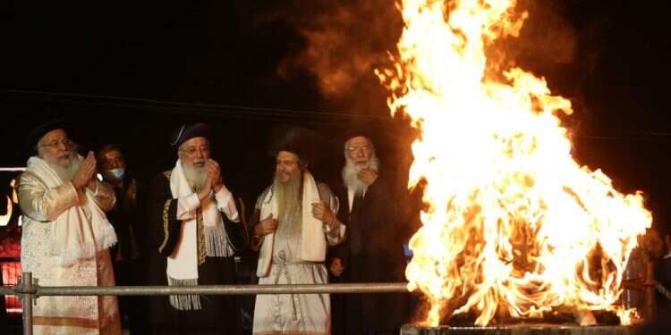 ההילולה במירון, בשנה שעברה. צילום: דוד כהן - ג׳יני הילולת ל"ג בעומר במירון צפויה להיערך במגבלות הדוקות