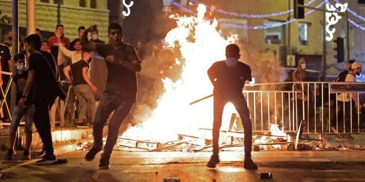 התפרעויות בירושלים. צילום: AFP יום ירושלים בפתח: מהומות צפויות ברחבי העיר