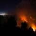 השריפה בהרי ירושלים, הלילה. צילום: AFP האש ממשיכה לבעור בהרי ירושלים, 17,000 דונם נשרפו