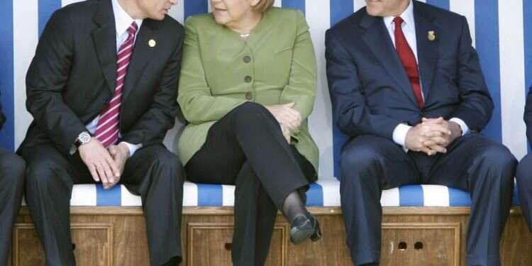 מנהיגים בעולם אחר. בוש, מרקל ופוטין בפסגת G8 ב־2007. צילום: איי אף פי לקראת יום הכיפורים: שני מנהיגים, שני חטאים