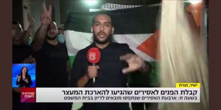 קבלת פני האסירים הלכודים בדגלי אש באולפנים ביקשו לשדר תמונת ניצחון, אבל היא רחוקה ומטושטשת