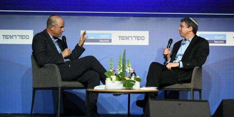 הרב חיים נבון ומיכה גודמן בוועידת מקור ראשון. צילום: שריה דיאמנט כמה שווה קילו תשומת לב? הרב חיים נבון ומיכה גודמן בשיחת עומק