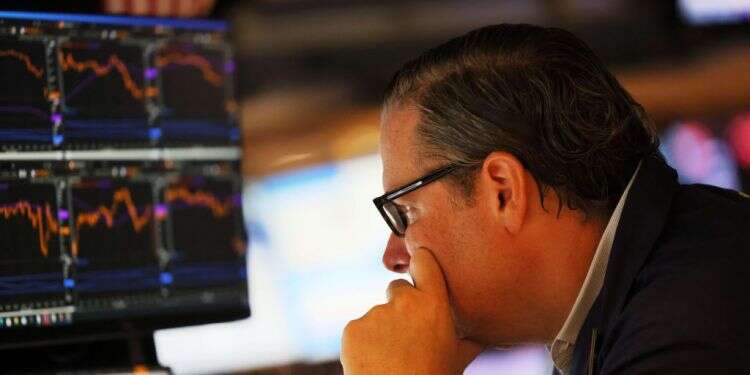 הבורסה בניו יורק, יולי 2022. צילום: AFP מחיר הכסף: איך העלאת הריבית בארה"ב מזעזעת את כלכלת העולם?