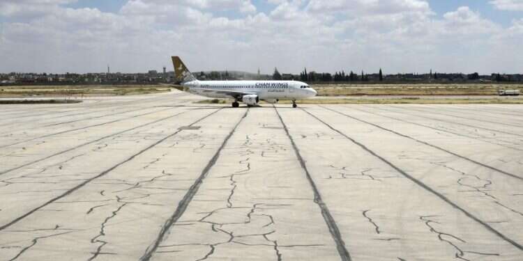 נמל התעופה בחלב. צילום: AFP שר החוץ הסורי מאיים: "ישראל משחקת באש"