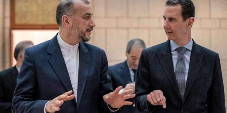 נשיא סוריה, בשאר אל-אסד, ושר החוץ האיראני, אמיר עבד אלהיאן. שצילום: AFP התקיפה בסוריה הועילה, אך ישראל צריכה לדאוג מבריתות מדינות ערב המתחדשות