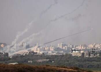 שיגור רקטות מהרצועה לעבר העיר שדרות. צילום AFP