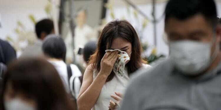 נערה יפנית בוכה, אילוסטרציה, צילום: איי.פי כת כוחנית: הסיפור המוזר מאחורי רצח ראש ממשלת יפן לשעבר