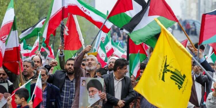 הפגנה של תומכי חמאס באיראן. צילום: איי.אף.פי הפגנה של תומכי חמאס באיראן.