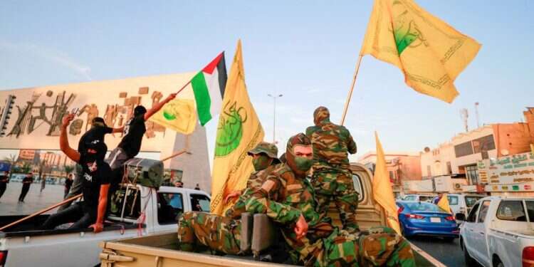 מחבלי חזבאללה בעיראק. צילום: AFP מחבלי חזבאללה בעיראק