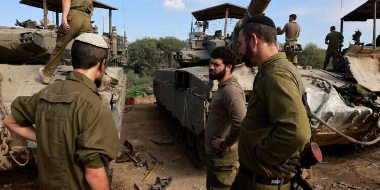 "להסדר יש תפקיד כגורם מחזק". חיילי מילואים בגבול עזה, אילוסטרציה. צילום: איי.אף.פי