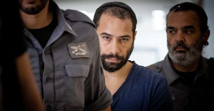 ראובן ולר, שהורשע בהמתת עמוס סער, בעת מעצרו. צילום: יונתן סינדל, פלאש 90 ראובן ולר, שהורשע בהמתת עמוס סער, בעת מעצרו.