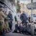 הפגנות נגד גיוס חרדים לצבא מחוץ ללשכת הגיוס בירושלים. צילום: חיים גולדברג - פלאש 90 הפגנות נגד גיוס חרדים לצבא מחוץ ללשכת הגיוס בירושלים. צילום: חיים גולדברג - פלאש 90