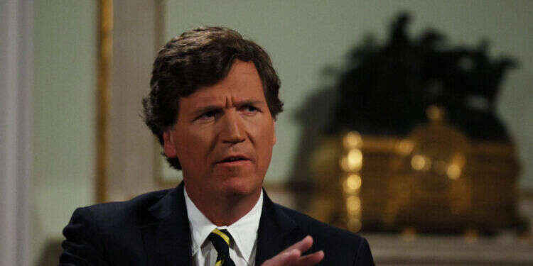 טאקר קרלסון. צילום: AFP טאקר קרלסון. צילום: AFP