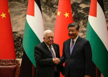 נשיא סין שי ג'ינפינג ויו"ר הרשות הפלסטינית אבו־מאזן, יוני 2023. צילום: איי.פי