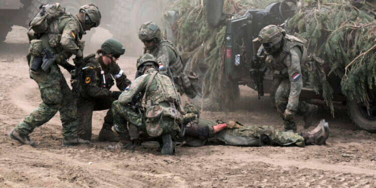 חיילים גרמנים בתרגיל המדמה מלחמה בליטא. צילום: EPA חיילים גרמנים בתרגיל המדמה מלחמה בליטא