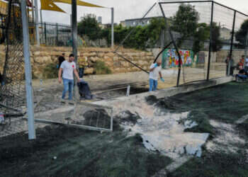 זירת נפילת הרקטה במג'דל שמס, שפגיעתה גרמה למות 12 נערים ילדים ולפציעת עשרות. צילום: מיכאל גלעדי, פלאש 90