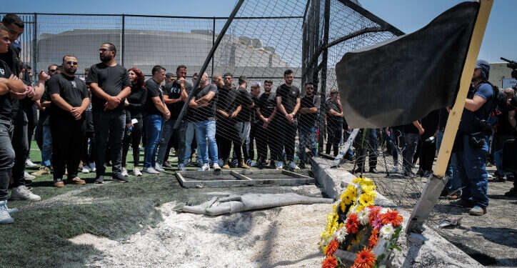 מקום נפילת הרקטה במגרש הכדורגל במג'דל שמס. צילום: מיכאל גלעדי, פלאש 90 "העדה הדרוזית – משפחה": ארגונים יהודיים תרמו מאות אלפי שקלים למג'דל שמס