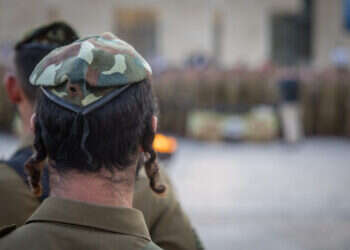 Israeli soldiers from Netzah Yehuda Battalion and family members attend a swearing-in ceremony at the Western Wall in Jerusalem's Old City, on July 10, 2024. Photo by Chaim Goldberg/Flash90 *** Local Caption *** חיילים חייל כותל ירושלים העיר העתיקה נחל חרדי נצח יהודה