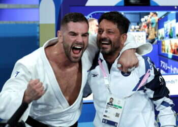 אורן סמדג'ה ופיטר פלטציק לאחר הזכייה. צילום: אי.פי.איי