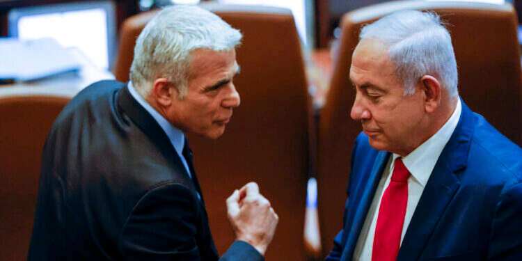 נתניהו ולפיד במליאת הכנסת. אוליבר פיטוסי, פלאש 90 "לקבוע עובדות בשטח": התוכנית של מנסור עבאס להקמת מדינה פלסטינית