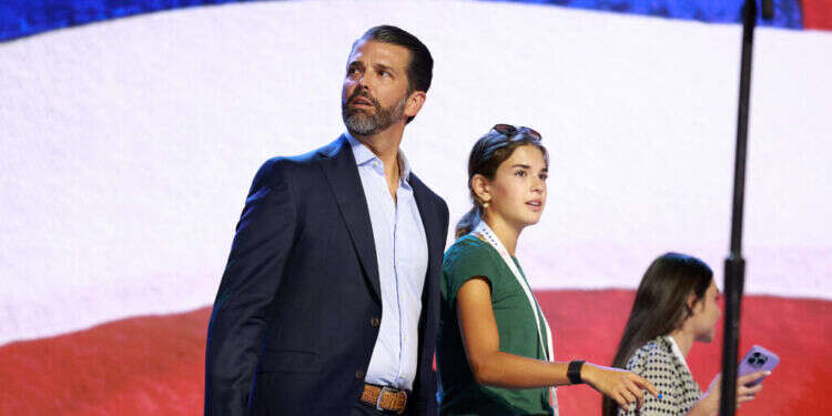 מעניין איזה מקום יתפוס בעסק המשפחתי. דונלד טראמפ ג'וניור עם בתו קאי. צילום: AFP מעניין איזה מקום יתפוס בעסק המשפחתי. דונלד טראמפ ג'וניור עם בתו קאי. צילום: AFP