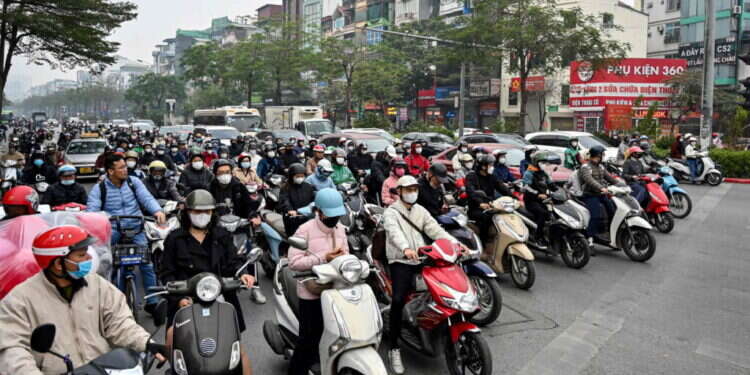 נהגים בווייטנאם. צילום: AFP וייטנאם: 200 דולר למי שילשין על עברייני תנועה