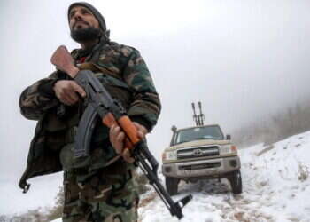 חיל מטעם הממשלה הסורית במחוז חומס בסוריה בשבוע שעבר. צילום: AFP