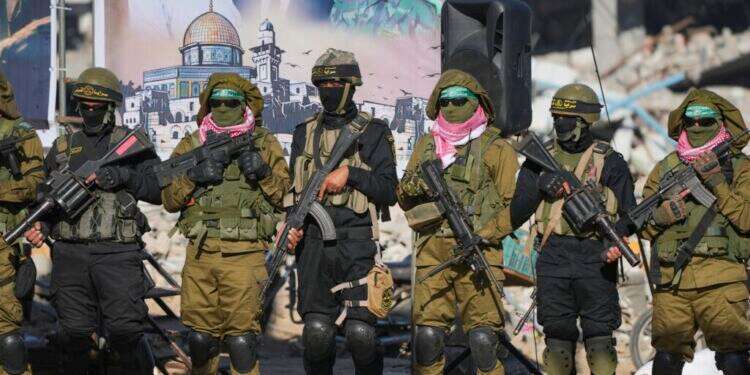 מחבלי חמאס וג'יהאד איסלאמי בעזה. צילום: AP מחבלי חמאס וג'יהאד איסלמי בעזה. צילום: AP