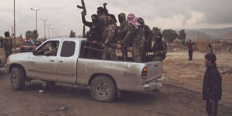 לוחמי מיליציות סוריות, דצמבר 2024. צילום: AP לוחמי מיליציות סוריות, דצמבר 2024. צילום: AP