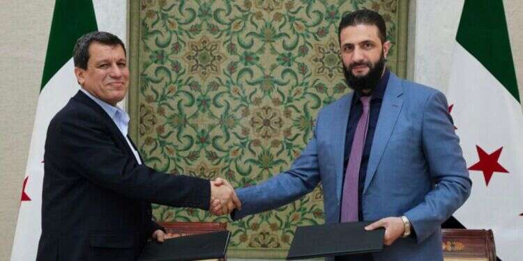 מנהיג סוריה א־שרע ומפקד צבא הכורדים עבדי. צילום: AP